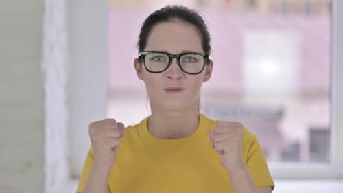 Distressed Woman Screams With Her Hands Up