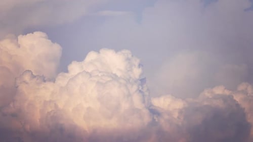 Golden Sunlight on a Cumulus Cloudscape