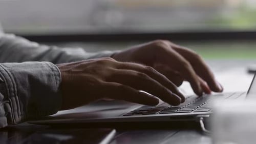 Writing Emails on Laptop Computer