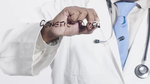 Doctor Writes Genetic Disease on Clear Surface