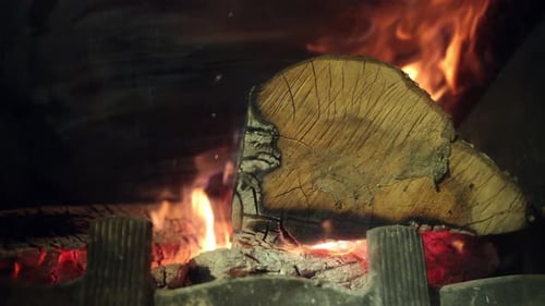 Wood Is Burning in Fireplace
