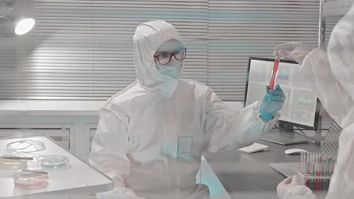 Scientists in Hazmat Suits Working