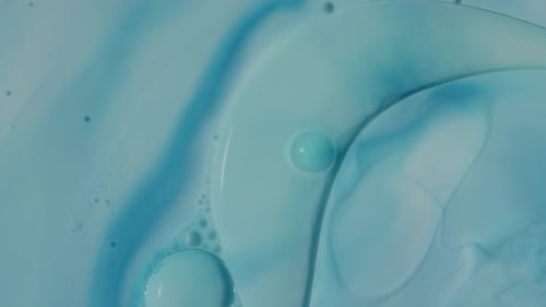 Swirling Turquoise Fluid with Microscopic Bubbles
