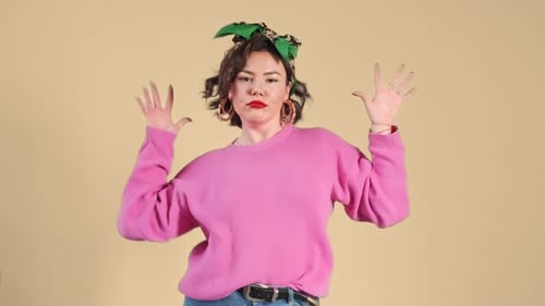 Woman with Brown Hair Dances and Smiles
