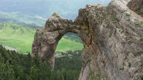 Arch in rock in mountains