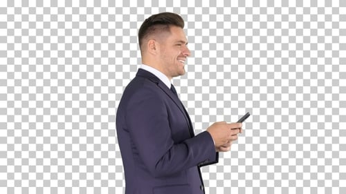 Man in Suit Using Phone on Green Screen