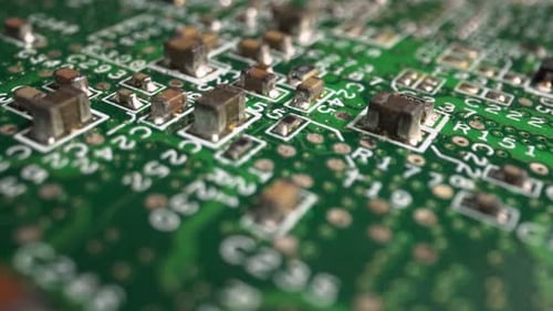 Extreme Closeup of Green Printed Circuit Board Electronics Shot with Dolly