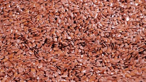 Close-Up View of Shiny Brown Flax Seeds