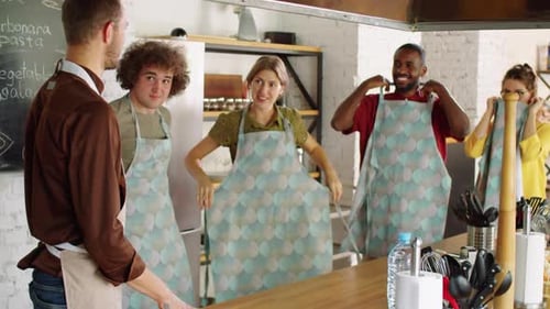 Cooking Class Students Ready to Learn in Kitchen