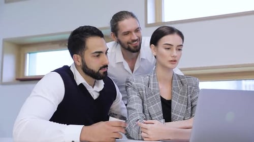 Business Meeting. People Working On Computer In Modern Office