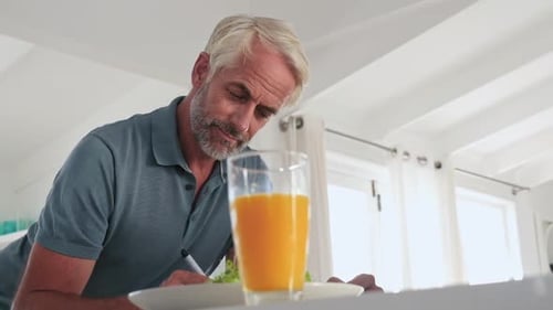 Man writing down