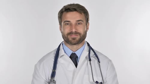 Tired Doctor Looking at Camera in Studio on White Background