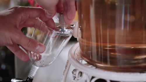 Dispensing Liquid Beverage from Glass Container