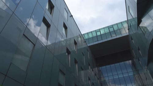 Modern Building with Glass Skybridge Connecting Structures