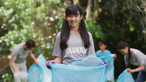 Volunteers Collect Garbage Outdoors