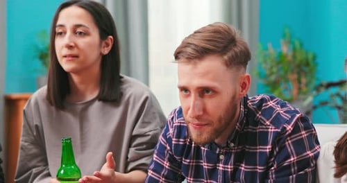 Friends Talking and Relaxing Indoors
