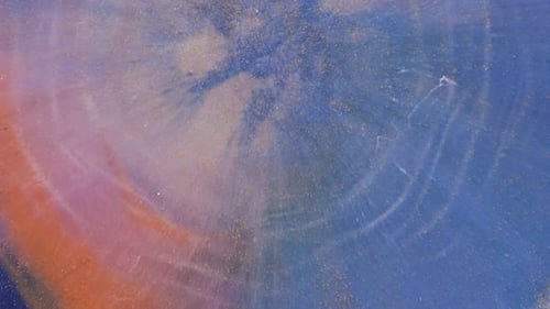 Abstract Swirling Texture in Blues, Oranges, and Golds