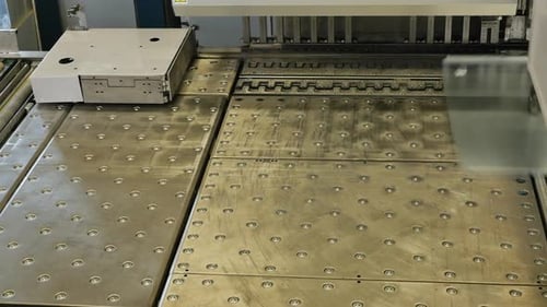 Fully automatic panel bending center in metal factory for shaping steel