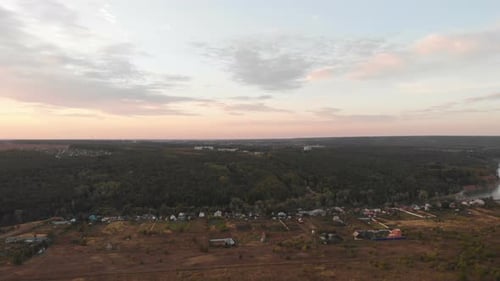 Aerial View of Rural Village at Sunrise