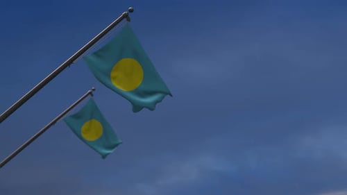 Realistic Palau Flag Waving in Blue Sky