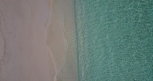 Tropical flying island view of a sunshine white sandy paradise beach and aqua turquoise water background