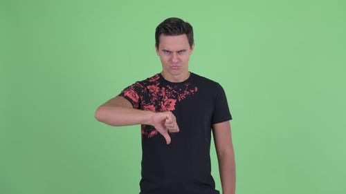 Young Adult Gives Thumbs Down on Green Screen