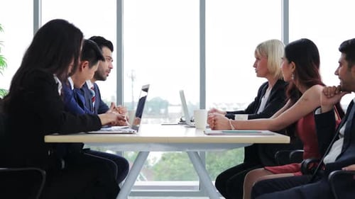 Diverse business team meetings and discussions together in office.