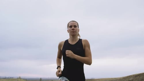 Caucasian Woman Doing Cardio Training Outdoors Background Cloudy Sky Front View