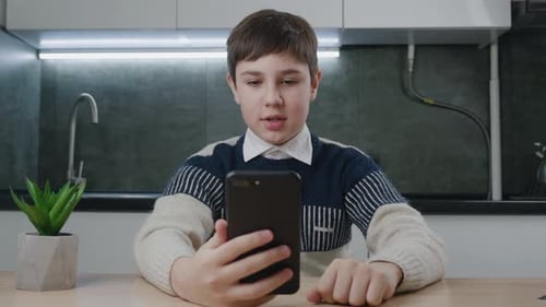Teen Boy Video Call in Kitchen