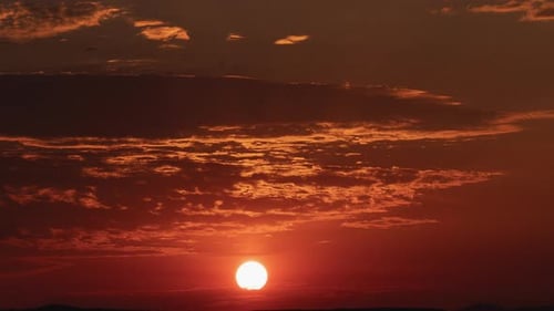 Fiery Sunrise Timelapse with Dynamic Cloudscape