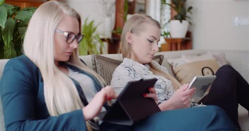 Businesswomen Discussing Over Technologies In Office, Businesswomen Working on Digital Tablet