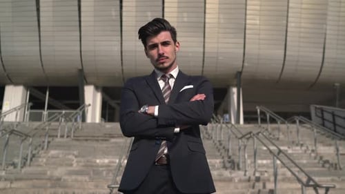 Businessman standing with his arms crossed