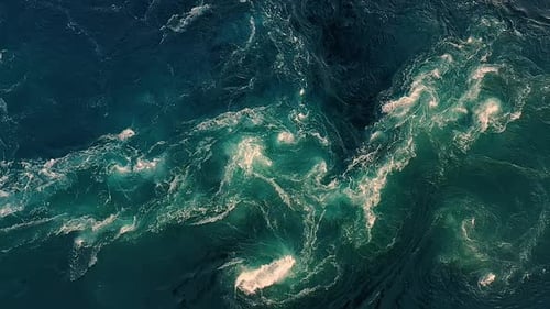 Waves of Water of the River and the Sea Meet Each Other During High Tide and Low Tide