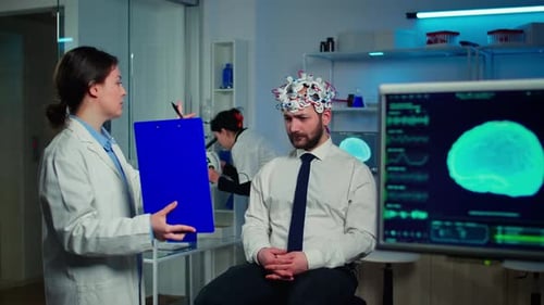 Doctor in Neurological Medicine Pointing on Clipboard Testing Eyesight