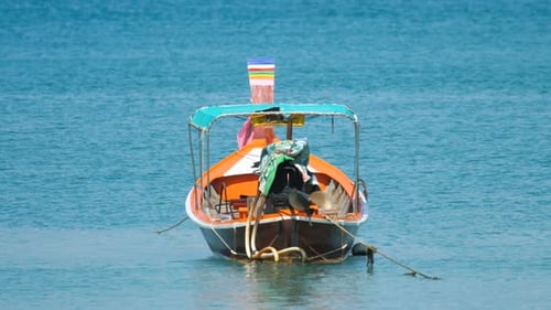 Longtail Motorboat Near Beach