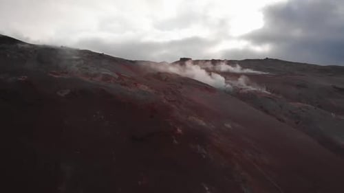 footage of steaming volcanic mountains