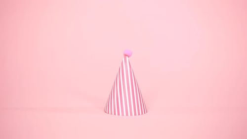 Party Hat on Pink Minimalist Background