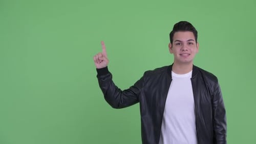 Smiling Young Adult Points Upward with Idea