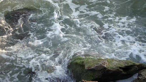 Waves Break on the Shore. Waves Break on the Rocks.