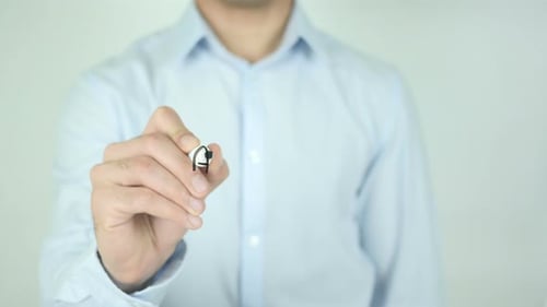 Man Writes the Word Accepted on Clear Surface