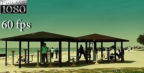 People Exercising at Outdoor Beach Fitness Area