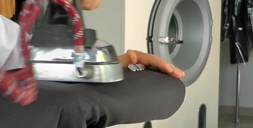 Ironing in Dry Cleaning Shop 1