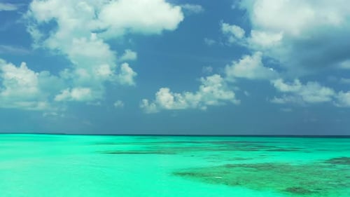 Luxury drone tourism shot of a white sand paradise beach and turquoise sea background