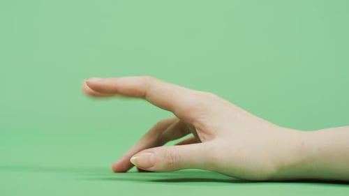 Hand Tapping and Scratching on a Green Screen