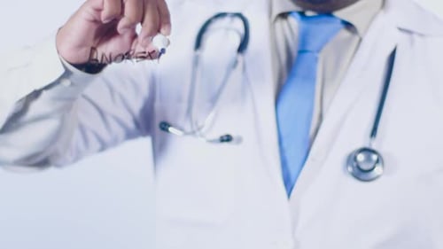 Doctor Writes Anorexia on Clear Surface