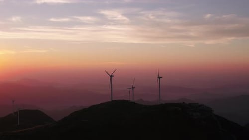 Wind Turbines in mountain during sunset