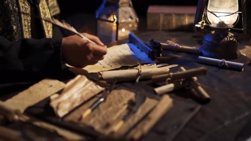 Writing with Quill Pen in Candlelight Setting