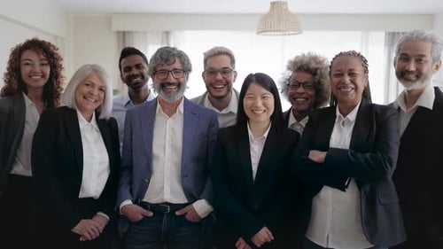 Business team of people standing in front of camera during meeting work