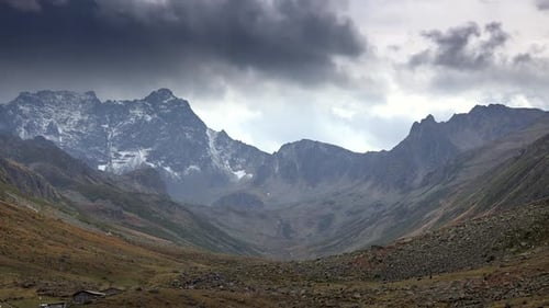 First Snow of the Year to High Rocky Mountain Peak Behind the Shack