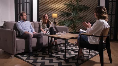 Couple in Therapy with Counselor in Office